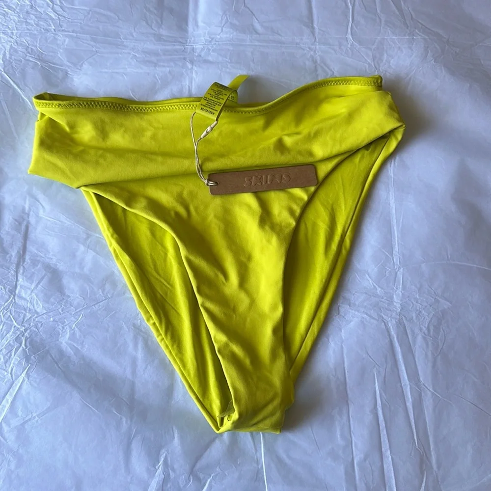 Skims swim bottoms MID WAIST COLOR: CITRUS SIZE: XS‎ NWT